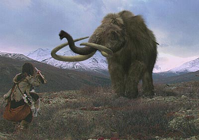 Representaci�n art�stica de un mamut y un cazador en el Holoceno. Entre 10 a 13 mil a�os antes se habr�a extinguido el mamut en casi todo el mundo, los �ltimos se habr�an extinguido en el norte de Siberia hace poco mas de 3 mil a�os mientras las pir�mides de Egipto se constru�an.